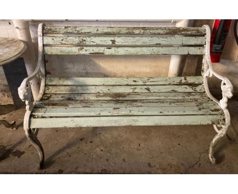 Cast aluminium ended garden bench with wooden slats and lion mask terminals.  (B.P. 21% + VAT) 