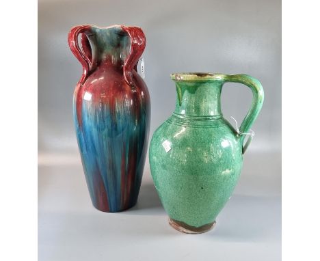 Art Nouveau organic design four handled vase with drip glaze designs, together with another pottery green ground baluster sin