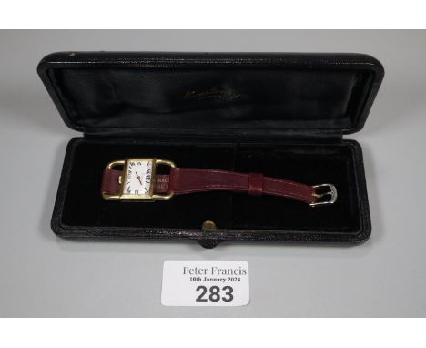 An unusual design 18ct gold Kutchinsky ladies quartz wristwatch, the inner case marked 'L U Chopard et Cie 18ct/750' on leath