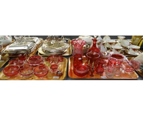 Two trays of mostly cranberry glass to include: Mary Gregory style inkpot and glass, celery vase, decanter with faceted stopp