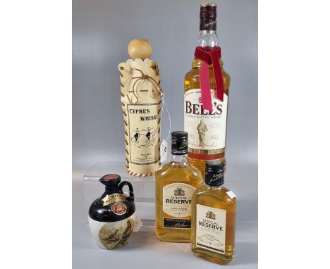 Collection of Whisky to include: Bell's 1L. 40% vol., two similar Special Reserve Whiskies 35 and 20cl., Cyprus Whisky and st