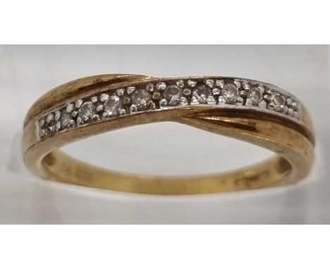 9ct gold nine stone eternity style ring.  2.1g approx.  Size L.   (B.P. 21% + VAT) 