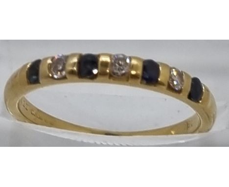 18ct gold diamond and sapphire seven stone ring.  2.3g approx.  Size L.   (B.P. 21% + VAT) 