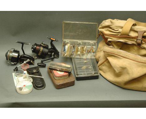 Vintage tackle bag containing Mitchell 300 fixed spool reel, Dam Quick 222 fixed spool reel, Tobies, mepps, hooks, etc. 