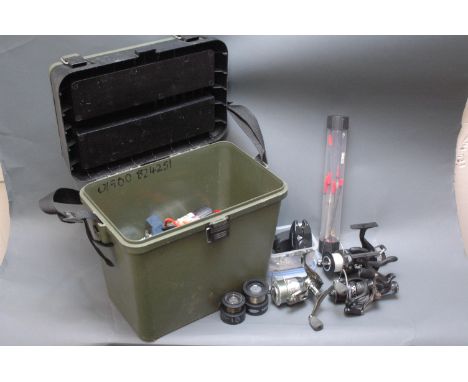 Tackle box/seat containing pike and carp fishing equipment, Dunlop bite indicators, fixed spool reels, etc. 