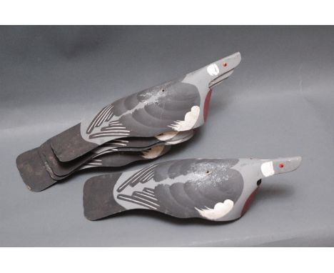 5 vintage pigeon shell decoys.