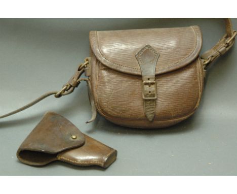 Child's vintage leather cartridge bag, stamped to rear "Made in England", height 15 cm, and leather pistol holster, 12.5 cm. 