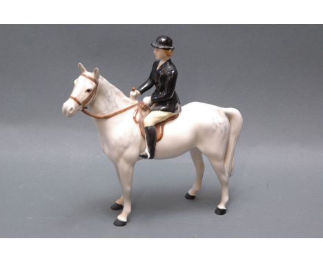 Beswick huntswoman on grey horse, Model No. 1730.  21 cm. 