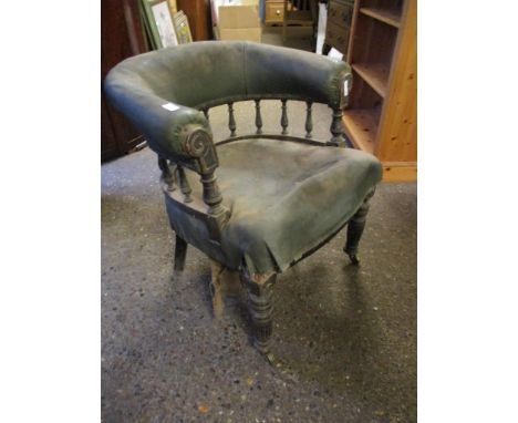 GREEN LEATHER BOW BACK OFFICE CHAIR WITH SPINDLE BACK AND REEDED FRONT LEGS RAISED ON BRASS CASTERS (A/F)