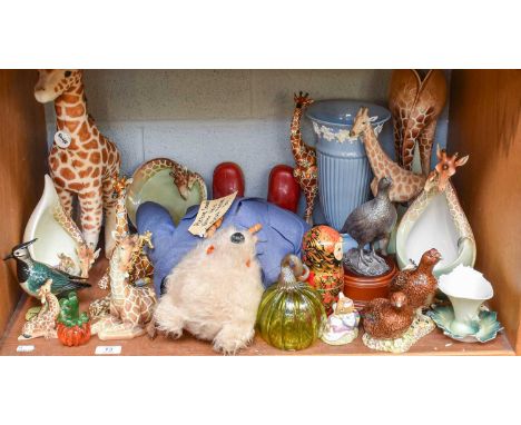 A Modern Steiff Giraffe, together with a quantity of giraffe themed Franz porcelain, similar giraffe collectables, a Paddingt