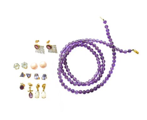 A Quantity of Earrings, including a pair of 9 carat gold garnet and diamond earrings; a pair of opal and diamond earrings; a 