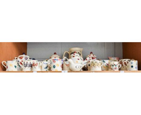 A Quantity of Emma Bridgewater Pottery, mugs, cups, teapots, sugar bowl, milk jugs (one shelf)Spotty teapot crazed, otherwise