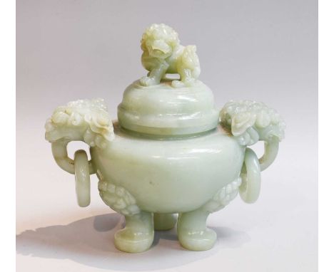 A Chinese Carved Celedon Jade Censor, 20th century, with lion dog finial, mythical beast handles and on three paw supports, 2