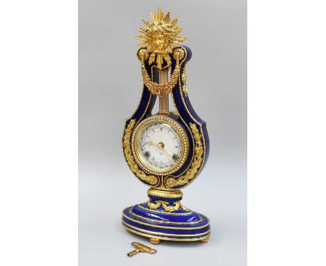 A Modern Lyre Form Mantel Clock, plaque underside base inscribed ''The Victorian Albert Museum Marie Antoinette Clock'', 39cm