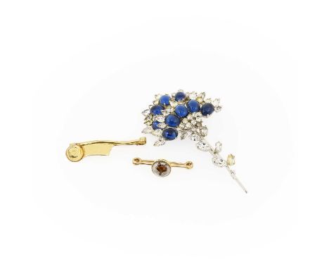 A Fox Mask Essex Crystal Brooch, stamped '18C', length 3.7cm;  A Christian Dior Floral Brooch, measures 9.1cm by 5.4cm; and A