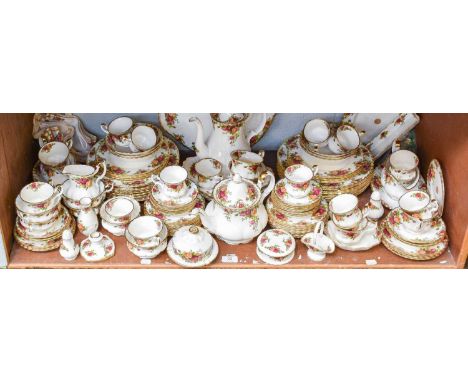 A Royal Albert Porcelain Dinner and Tea Service, decorated in the ''Old Country Roses'' pattern (one shelf)
