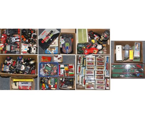 A Large Collection of Mainley Vintage Toys Including: Diecast vehicles (boxed and playworn), various battery powered robots a