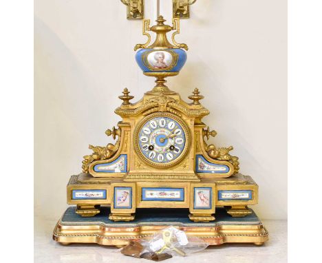 A French Gilt Metal Porcelain Mounted Striking Mantel Clock, beneath glass dome, circa 1890