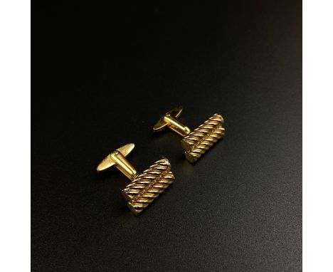 A pair of gold plated gentleman's cufflinks with a twin barley twist design by Christian Dior with maker's marks. 