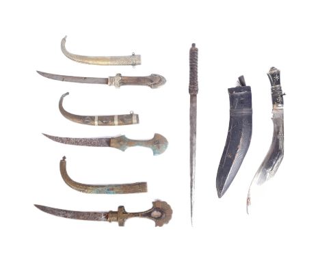 A collection of x5 assorted early 20th Century ethnic / tribal daggers comprising; x3 Moroccan&nbsp;koummya, an Indian Kukri 