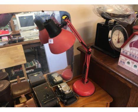 An angle poised style lamp, sold as collector's item