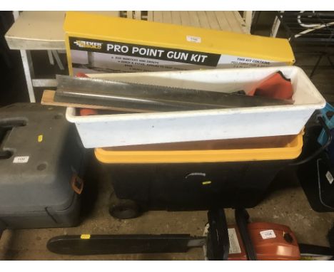 A tool box and contents of various decorators tools 