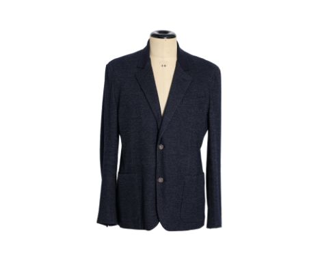 A LOUIS VUITTON NAVY SUIT JACKET
Textured jacket with contrasting collar, two front patch pockets, a chest pocket, and a two-