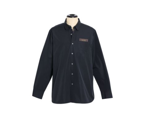 A LOUIS VUITTON REGULAR 'DNA' POPLIN SHIRT
With clipped collar tips, mother of pearl button with LV stitching, signature stap