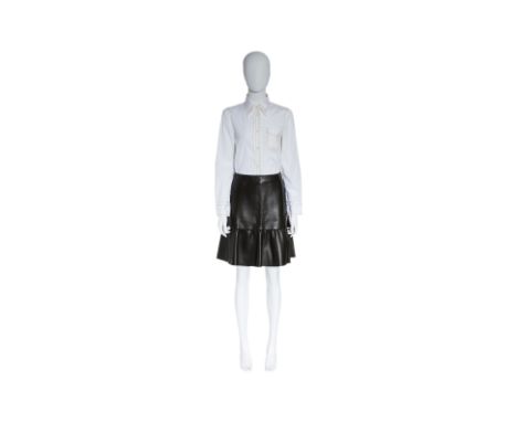 A PRADA CHAIN-STITCH SHIRT AND LEATHER SKIRT
Including a white button-down collared shirt with single breast pocket and chain