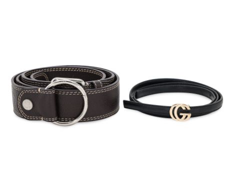 A PAIR OF CELINE AND GUCCI LEATHER BELTS
Céline brown leather belt featuring contrast white stitching and silver-tone hardwar