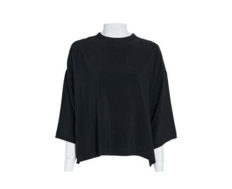 A CELINE BLACK OVERSIZED BLOUSE BY PHOEBE PHILO
With a crew neckline and back zipper cosure
Size 38
Condition: For a conditio