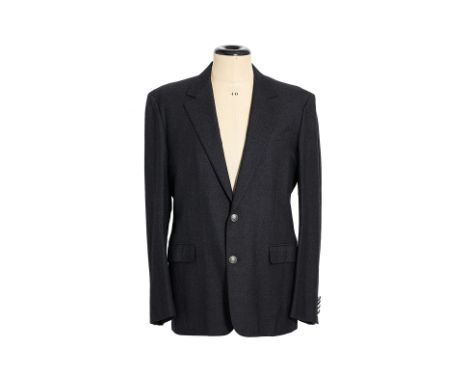 A LOUIS VUITTON DARK GREY WOOL SUIT JACKET
Featuring a two-button closure, notched lapels, three front pockets, four internal