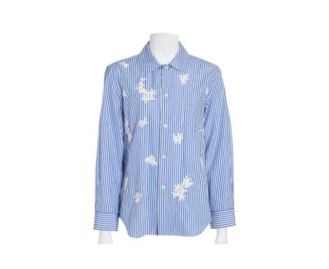 A TRICOT BY COMME DES GARCONS BLUE AND WHITE STRIPED SHIRT
With a collared button front and chest pocket, featuring scattered