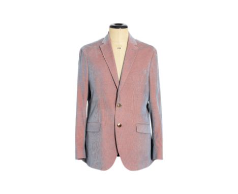 AN ETRO RIBBED VELVET JACKET
A blue and orange color shift depending on the angle, featuring a two-button closure, notched la