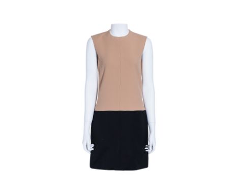 A CELINE SLEEVELESS SHIFT DRESS BY PHOEBE PHILO
Featuring a two-tone design, with a camel-toned upper and black skirt, fitted