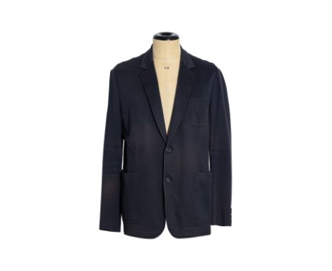 A LOUIS VUITTON DARK NAVY SUIT JACKET
Featuring a two-button closure, two front patch pockets, and a chest pocket with distin