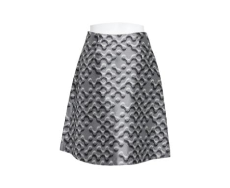 A PRADA MOLECULAR PATTERN SKIRT
Silver and black molecular pattern, metallic finish, concealed side zip fastening
From 2015, 