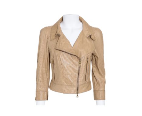 A PRADA BEIGE LAMBSKIN BIKER JACKET
Perforated leather, featuring an asymmetrical zip front, notched lapels, gold-tone hardwa