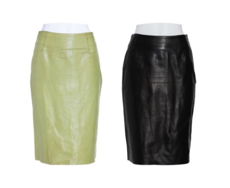 A PAIR OF PRADA LEATHER A-LINE SKIRTS Including one example in light green leather, and the other is in black, featuring a hi