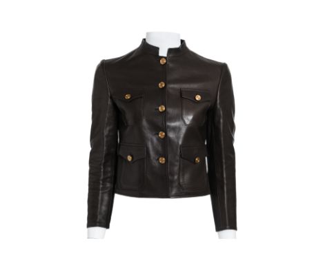 A GUCCI DARK BROWN LEATHER JACKET BY TOM FORD
Stand collar with front button closure, four front flap pockets with gold-tone 