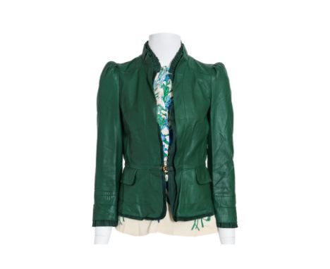 A GUCCI LEATHER JACKET AND HALTER TOP ENSEMBLE
Including a green leather jacket featuring a High collar with ruffle trim, gat