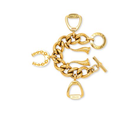 A CELINE EQUESTRIAN CHARM BRACELET
Gold-tone charm bracelet, featuring oversized chain links and equestrian-themed charms, in