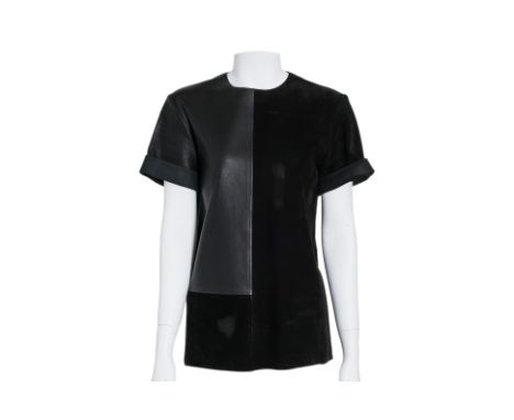 A CELINE LEATHER TOP BY PHOEBE PHILO
Featuring a panel design in contrasting black leather and suede with a zip closure at th