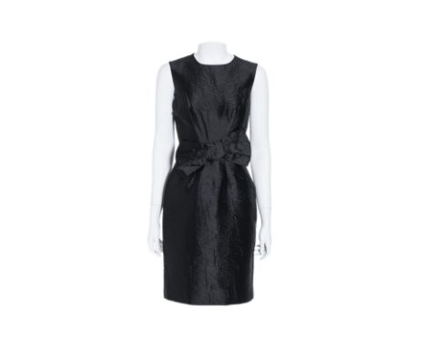 A PRADA BLACK SLEEVLESS SHEATH DRESS
Featuring a front bow detail and back zip closure
Size 38
Condition: For a condition rep