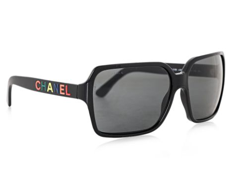 A PAIR OF CHANEL RECTANGULAR SUNGLASSES
Black acetate frame featuring multi colored "CHANEL" logo lettering on the temples, R