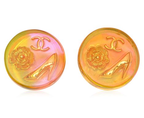 A PAIR OF CHANEL BUTTON EARRINGS
Iridescent resin clip-on earrings with a holographic effect, featuring CC logos, camelias, a