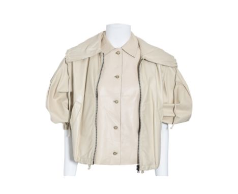 A PRADA BEIGE LEATHER VEST AND JACKET ENSEMBLE
Circa 1990's, with gathered short sleeves, front zipper closure, and drawstrin