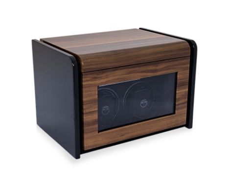 A BODA CONCEPT WATCH WINDER
Walnut case with double hinged lift up cover, with glazed front, two winders and storage for thre