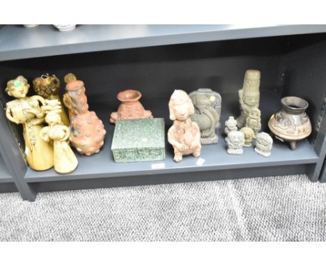 An interesting collection of 20th century South American clay figures, largest 29cm, sold together with a green patinated sto