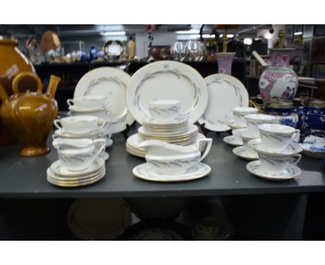 A collection of Royal Worcester fine bone china, decorated with floral patterns within a gilt edge, makers mark to base, appr